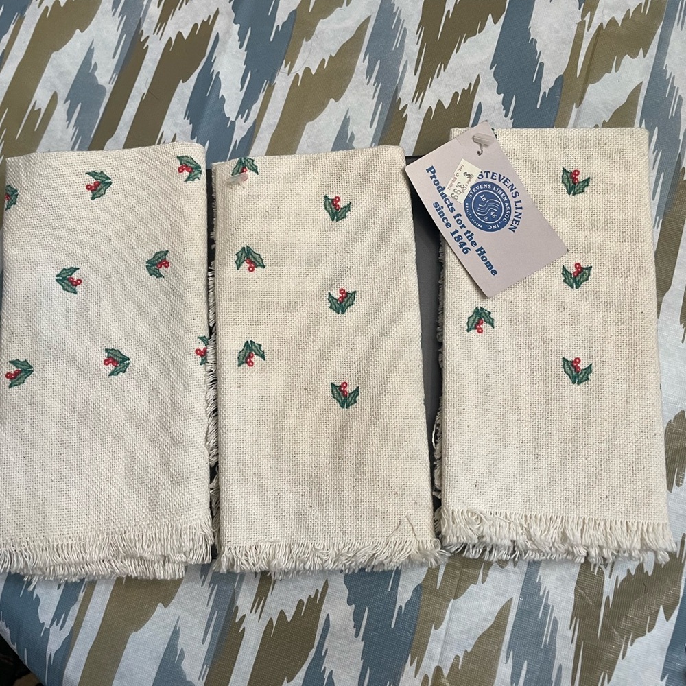 Brand new set of three linen napkins. New with tags attached.